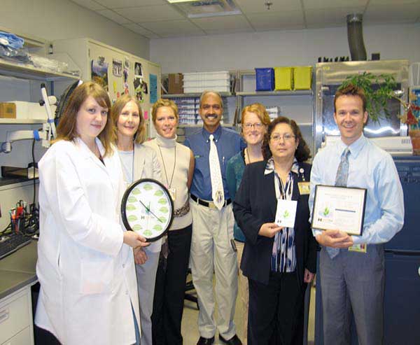 Cytopathology lab group with sustainable lab certificate