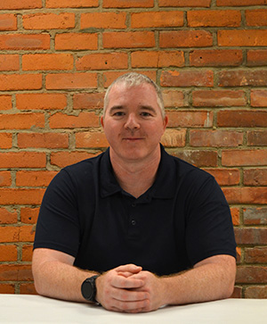 Staff headshot of Justin Nelson.